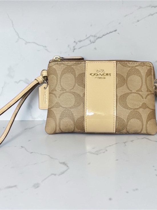 Coach Handbags - Coach Beige Signature Canvas Wristlet with Patent Center Stripe